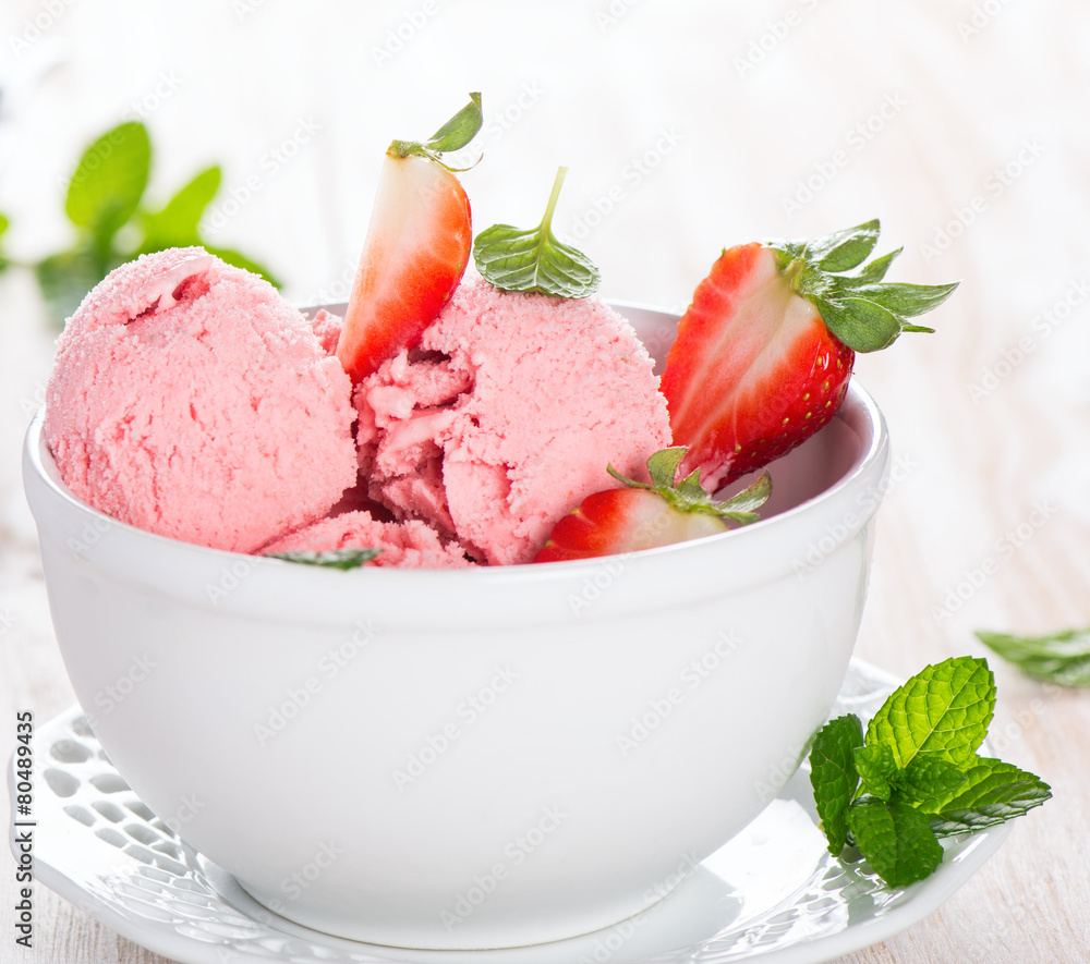 strawberry ice cream and leaves of mint strawberry ice cream and leaves of mint