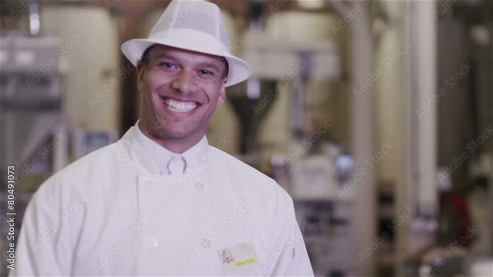 Portrait of friendly smiling factory worker in the food and drink industry Portrait of friendly smiling factory worker in the food and drink industry