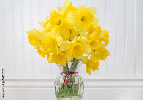 Fototapeta Naklejka Na Ścianę i Meble -  Daffodils in a vase in rustic setting - horizontal