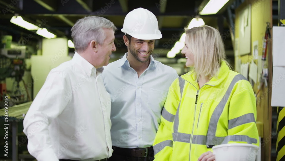 Portrait of attractive warehouse management staff of mixed ages Portrait of attractive warehouse management staff of mixed ages