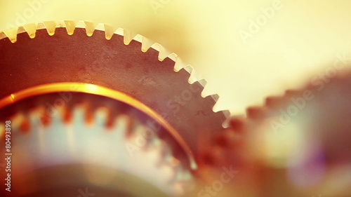Golden gears with cogs in action. HD 1080p, Loop-ready