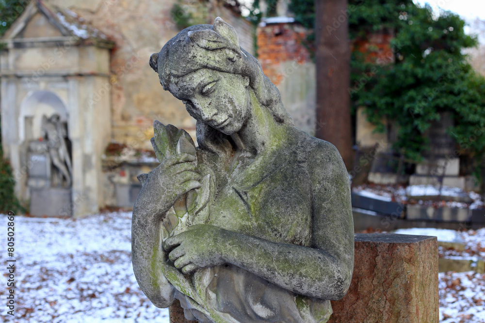 Stone Girl on Tomb from old Prague Cemetery, Czech Republic