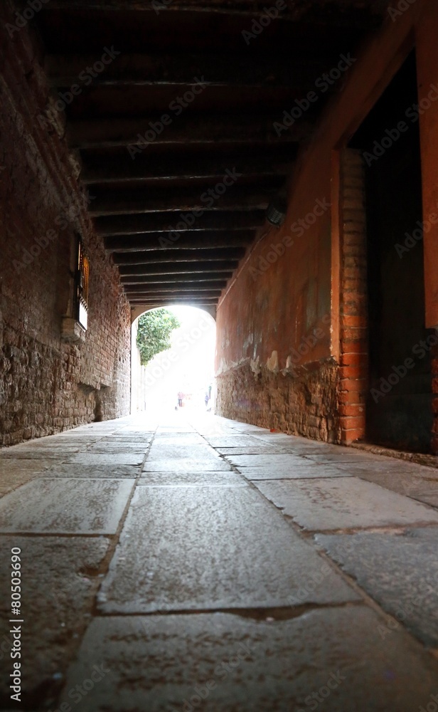 Obraz premium porch in red brick in venice italy