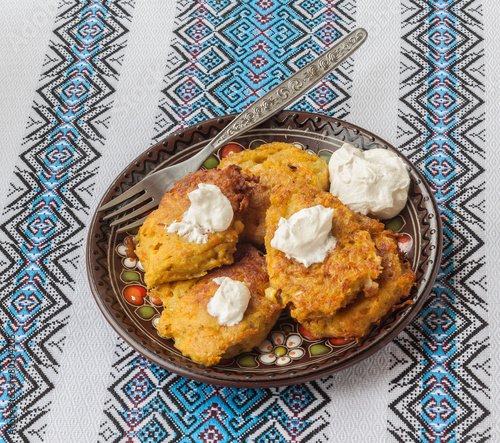 Traditional Ukrainian homemade potato pancakes (draniks) photo