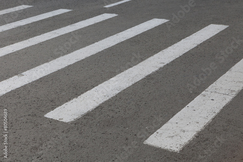 striped marking of the crosswalk on road