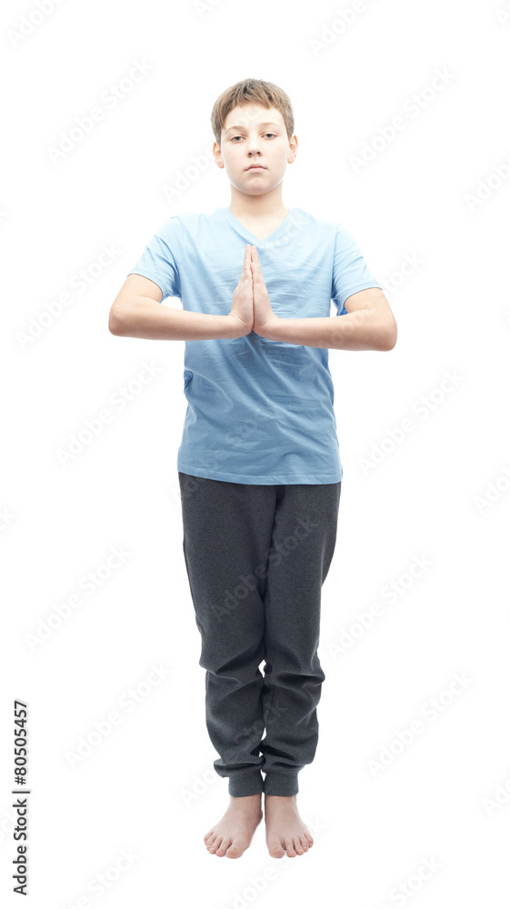Young boy doing yoga Young boy doing yoga