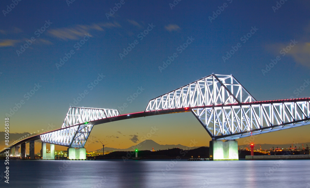 Naklejka premium Tokyo gate bridge and Mountain Fuji at twilight time