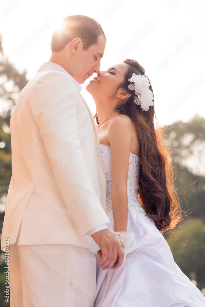 Kissing bridal couple