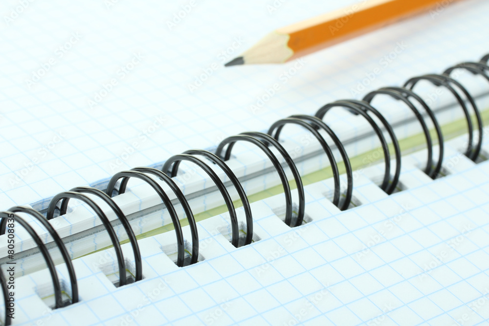 school supplies: notebook and pencil isolated school supplies: notebook and pencil isolated