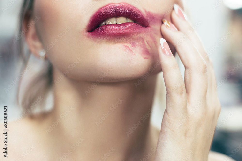 Fototapeta premium Sexual lips with the smeared lipstick
