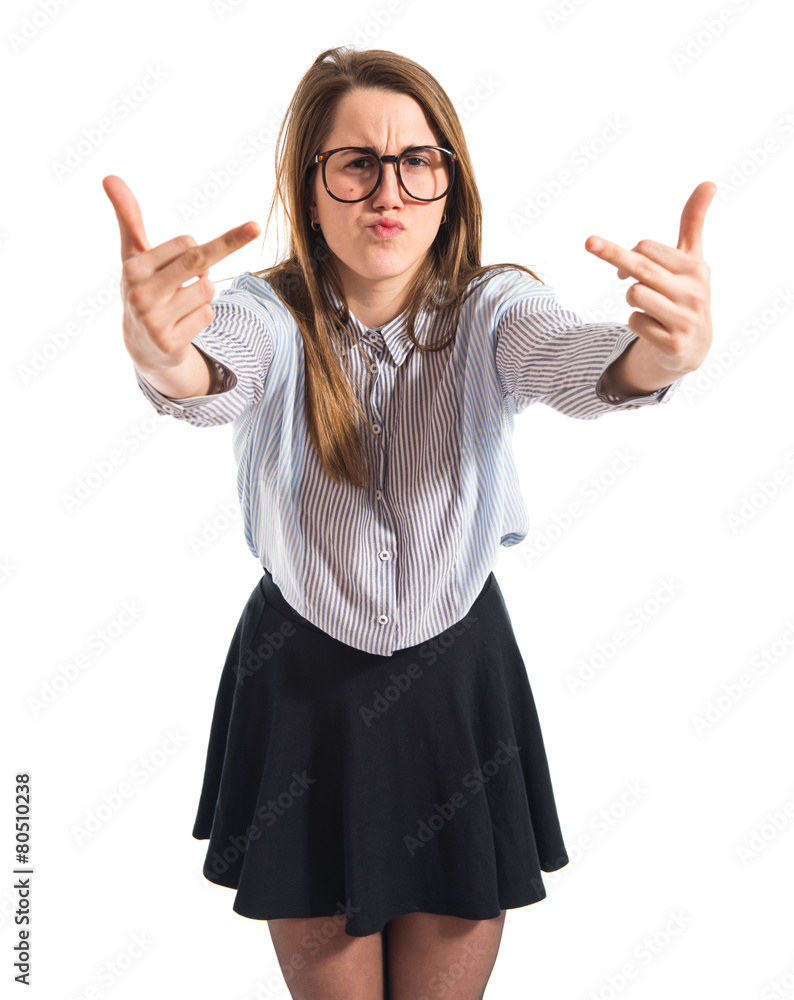 Cute girl making horn gesture