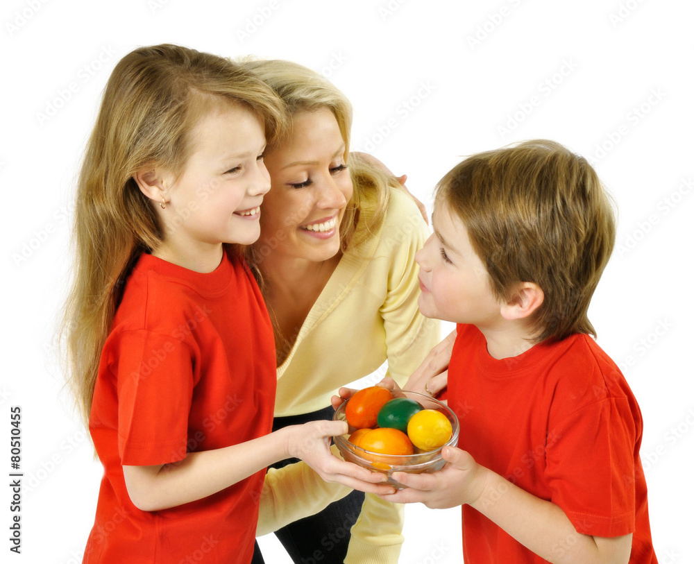Mother and her children with easter eggs Mother and her children with easter eggs