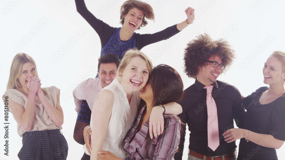 Happy mixed ethnicity group jumping for joy on white background in studio shot Happy mixed ethnicity group jumping for joy on white background in studio shot