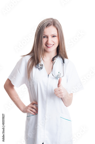 Confident woman doctor showing thumb up