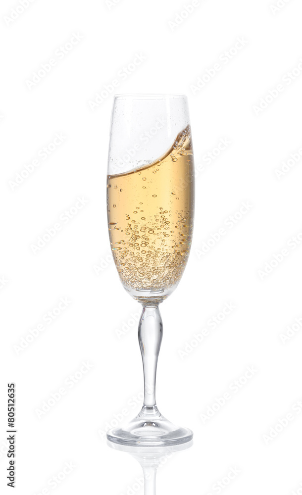 Champagne in a glass. Isolated on white background Champagne in a glass. Isolated on white background