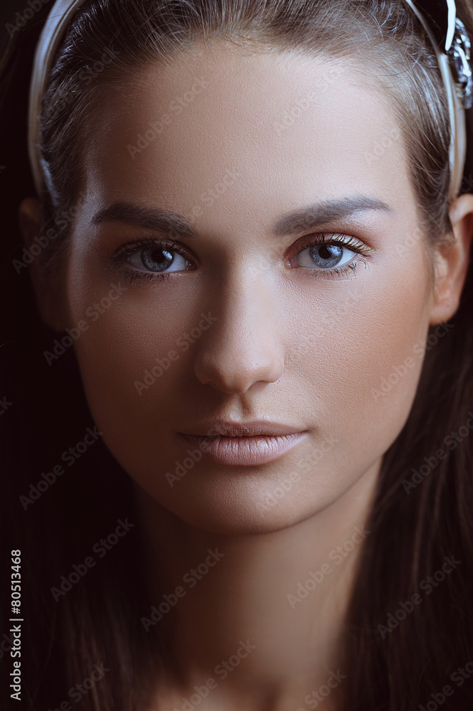 Obraz premium Young beautiful woman with perfect skin in nature makeup
