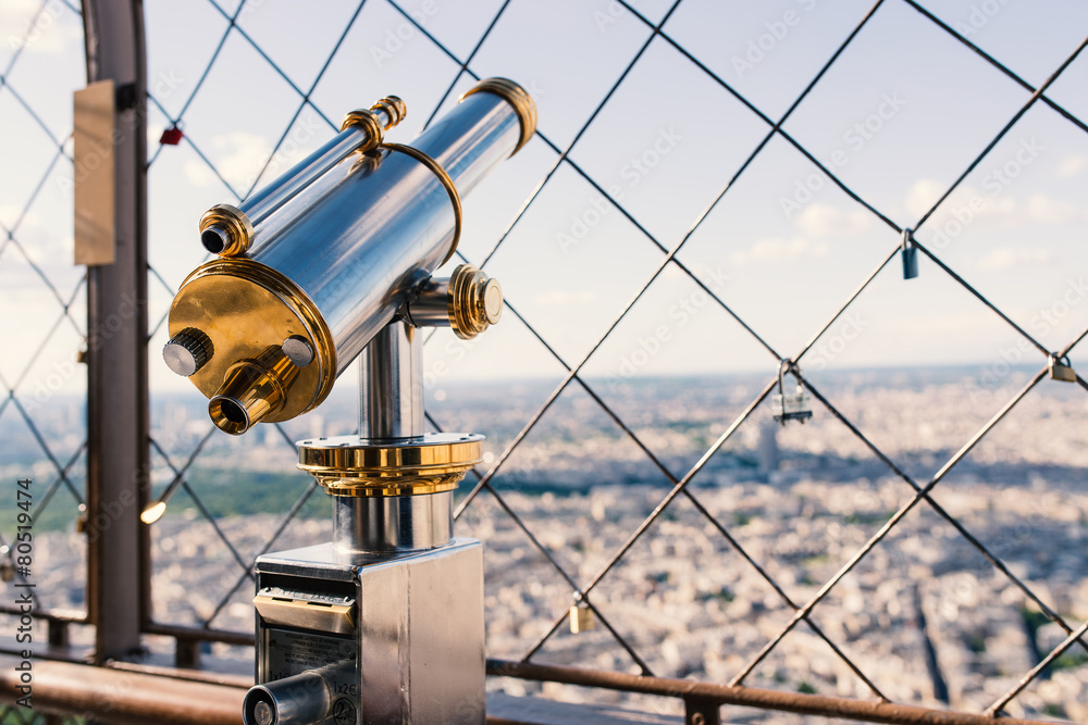 Obraz premium Binoculars at the top of Eiffel Tower in Paris, France. Filtered
