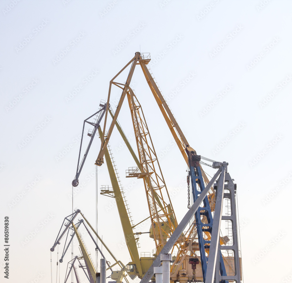 Port cranes against the sky