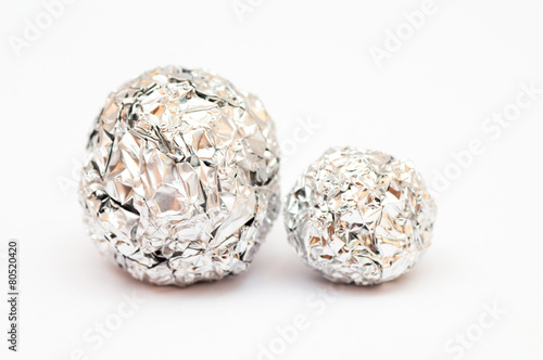 Balls made of tine foil next to each other