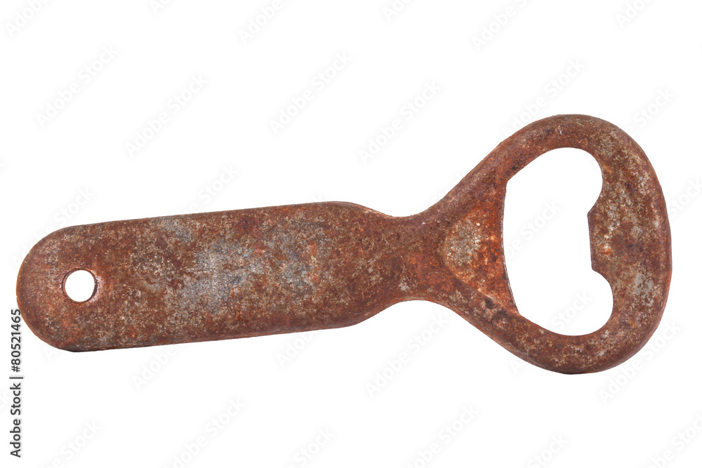 The Rusty bottle opener on white background The Rusty bottle opener on white background