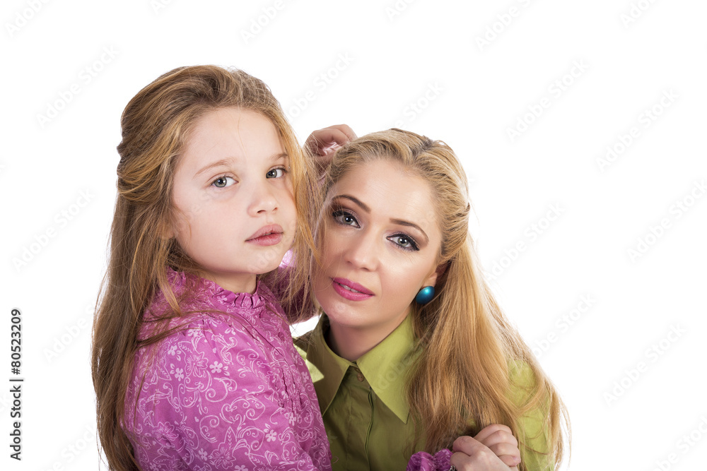 Portrait of a happy mother and her pretty daughter Portrait of a happy mother and her pretty daughter