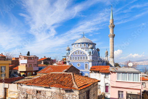Street view with Fatih Camii mosque, Izmir, Turkey photo