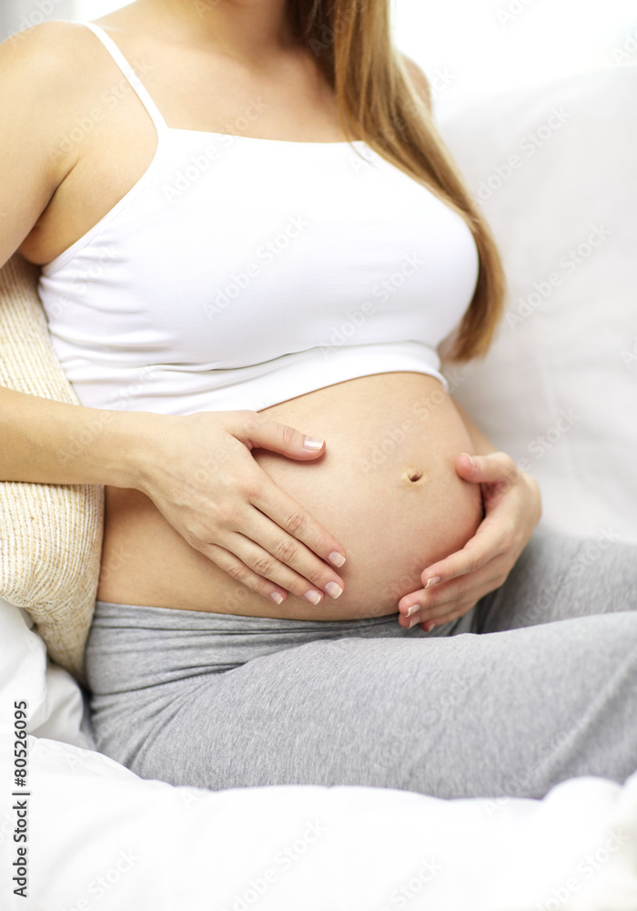 close up of happy pregnant woman at home close up of happy pregnant woman at home