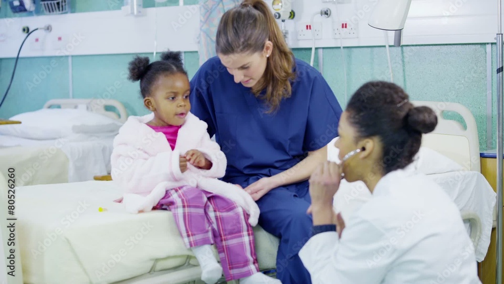 Female doctor uses a stethoscope to examine cute little girl in hospital. Female doctor uses a stethoscope to examine cute little girl in hospital.