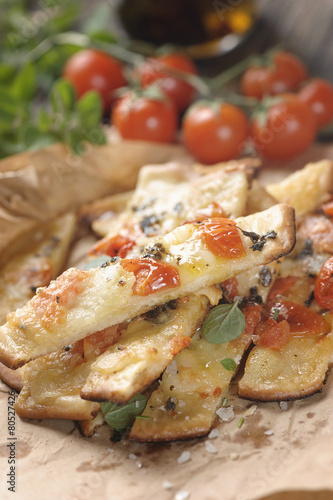 Pizza with cherry tomatoes and cheese