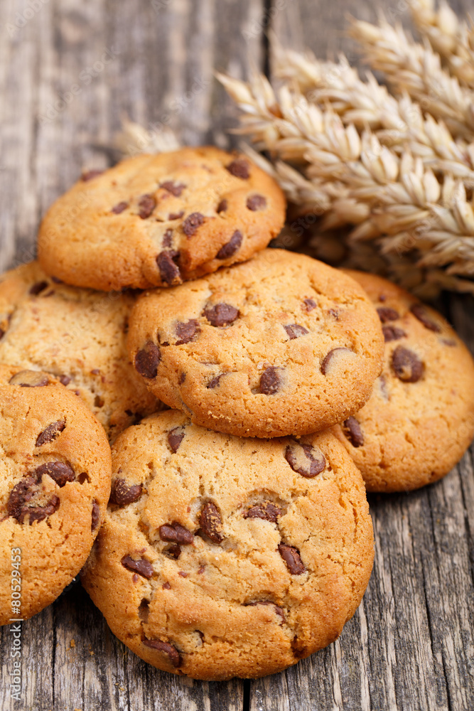 Cookies with wheat on a wooden table. Cookies with wheat on a wooden table.