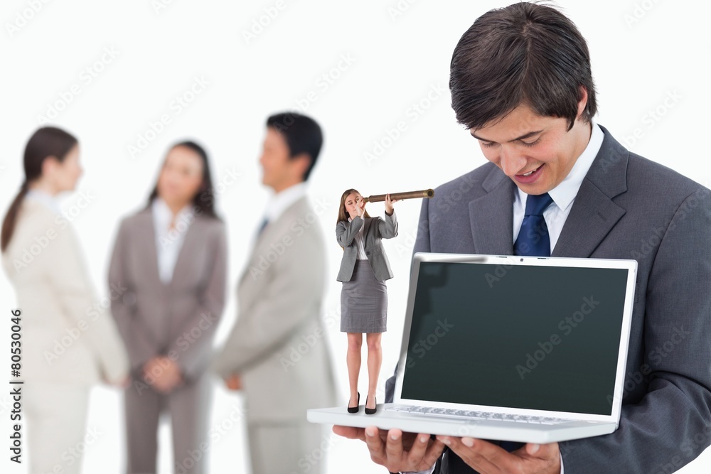 Composite image of businesswoman looking through a telescope Composite image of businesswoman looking through a telescope