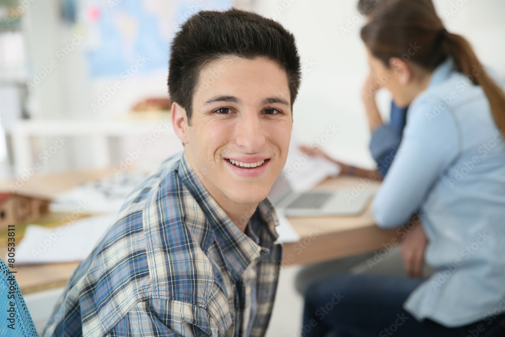 Portrait of college boy attending class Portrait of college boy attending class