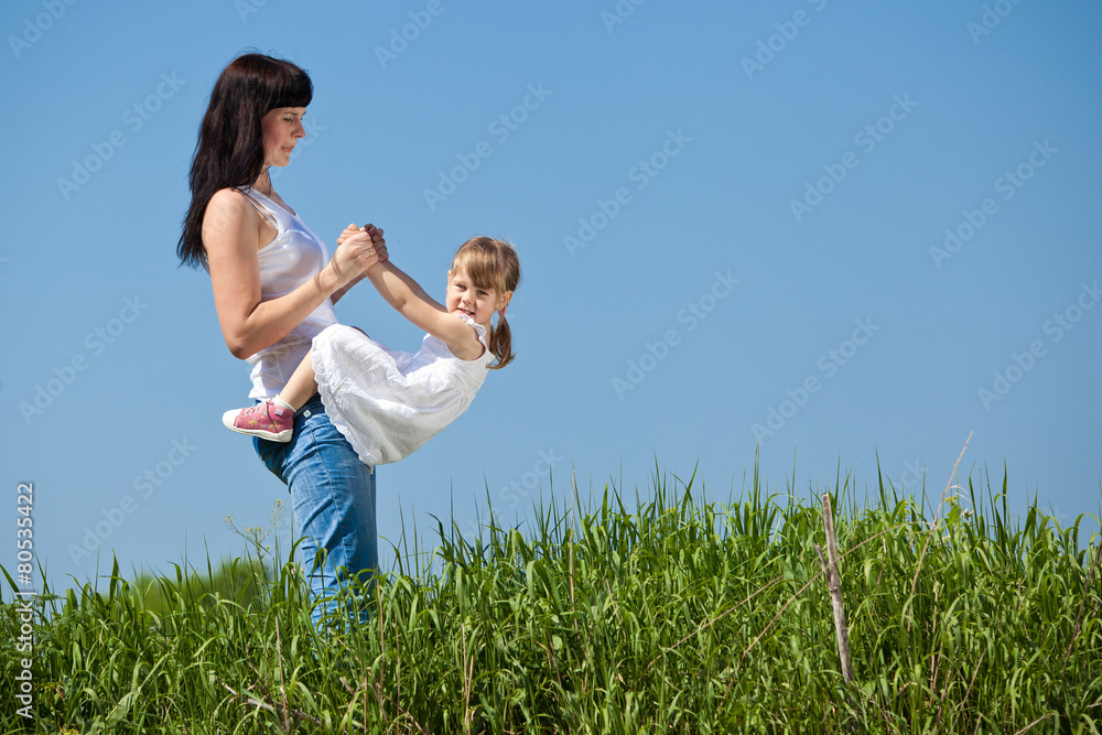 mother with her daughter in nature mother with her daughter in nature