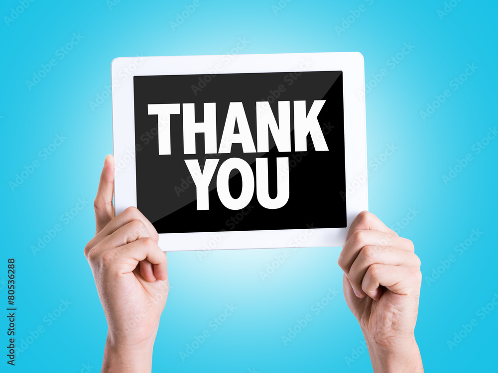 Tablet pc with text Thank You with blue background Tablet pc with text Thank You with blue background
