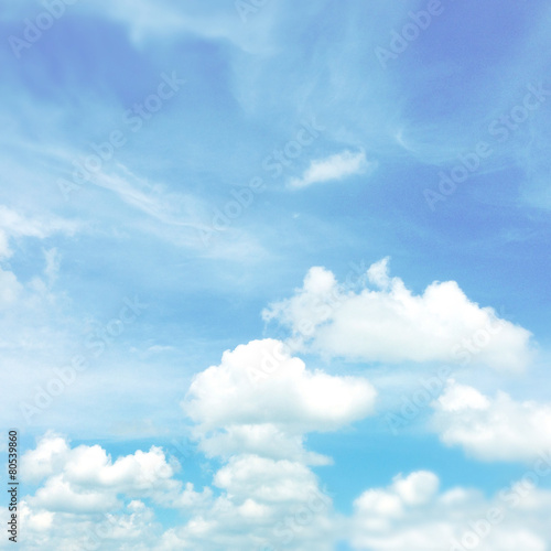 Fluffy soft white clouds in blue sky