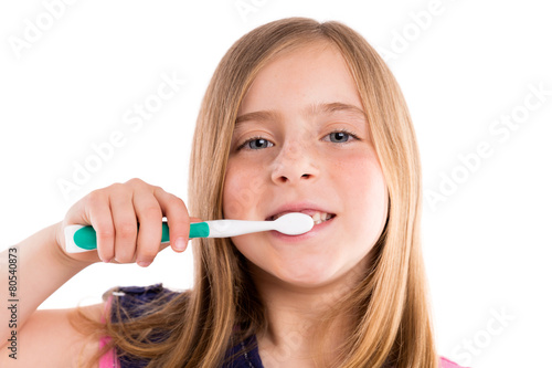 Blond kid indented girl cleaning teeth toothbrush