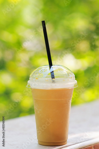 Inviting iced drink in a covered cup