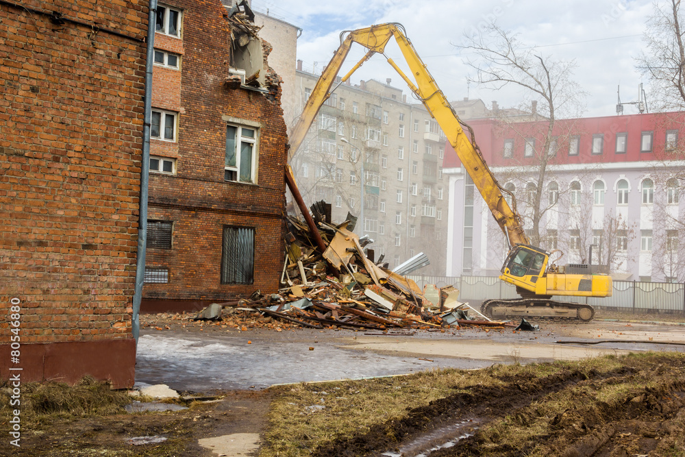 excavator demolishes old school building excavator demolishes old school building