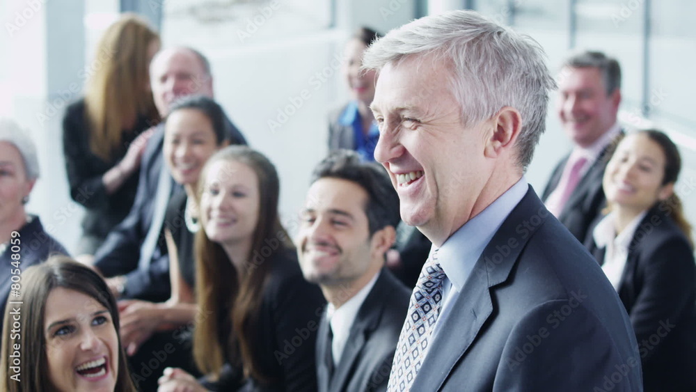 Diverse group of business people attend a business seminar Diverse group of business people attend a business seminar