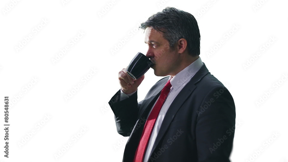 Portrait of mature successful businessman drinking coffee on white background Portrait of mature successful businessman drinking coffee on white background