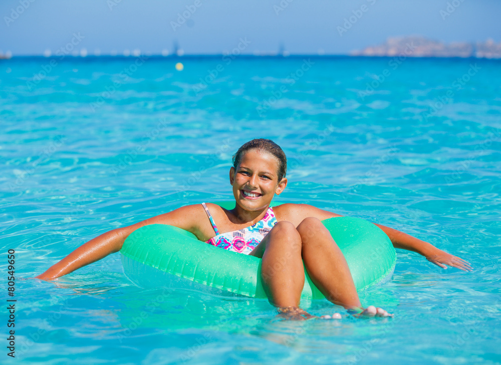 Girl relaxing in the sea