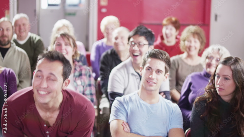 Mature male speaker addresses a public meeting Mature male speaker addresses a public meeting