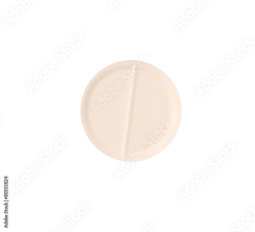Macro orange medical pill tablet isolated on white