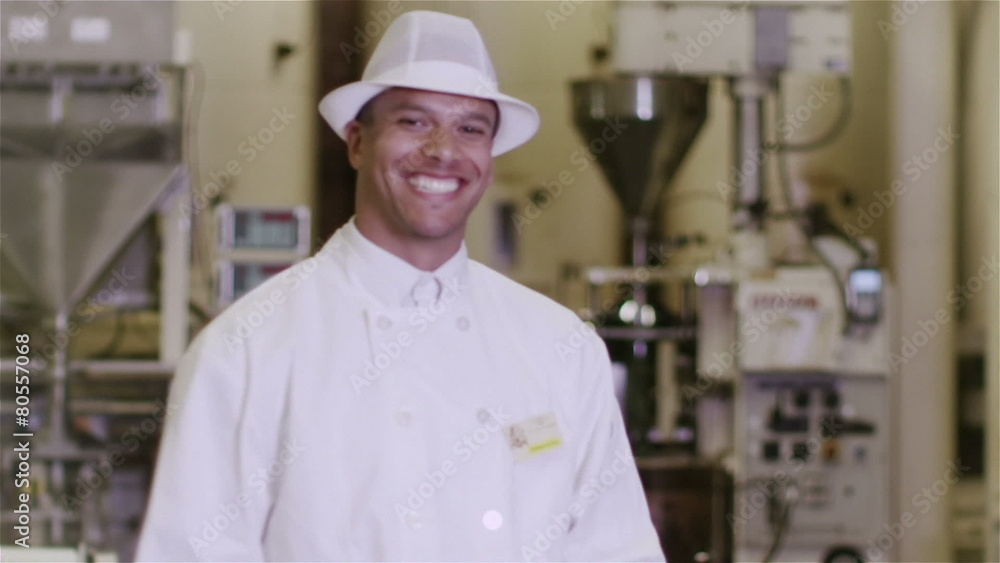 Portrait of friendly smiling factory worker in the food and drink industry Portrait of friendly smiling factory worker in the food and drink industry