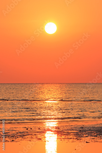 Golden orange sunset tropical sea background © jcsmilly