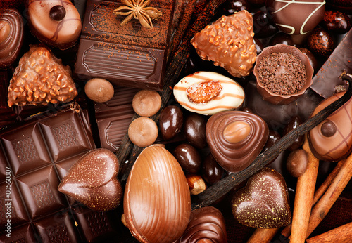 Chocolates background. Praline chocolate sweets