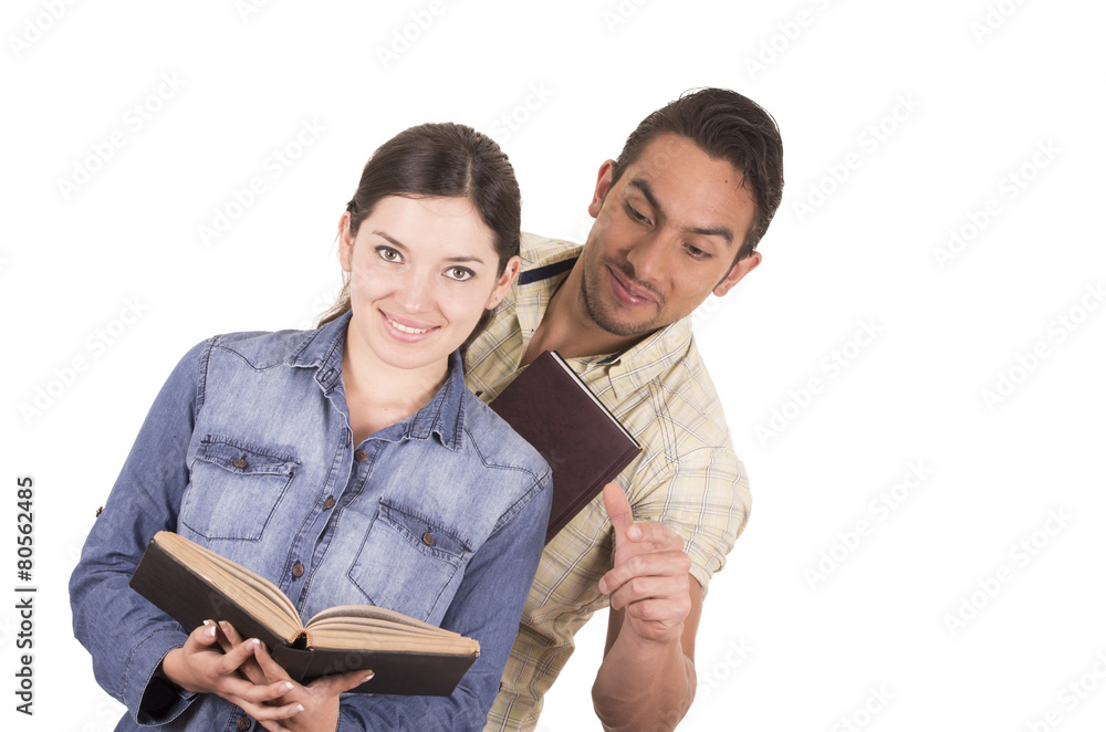 couple of cheerful happy attractive students holding book couple of cheerful happy attractive students holding book