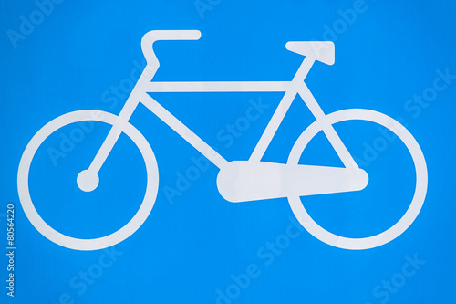 Blue bicycle sign closeup