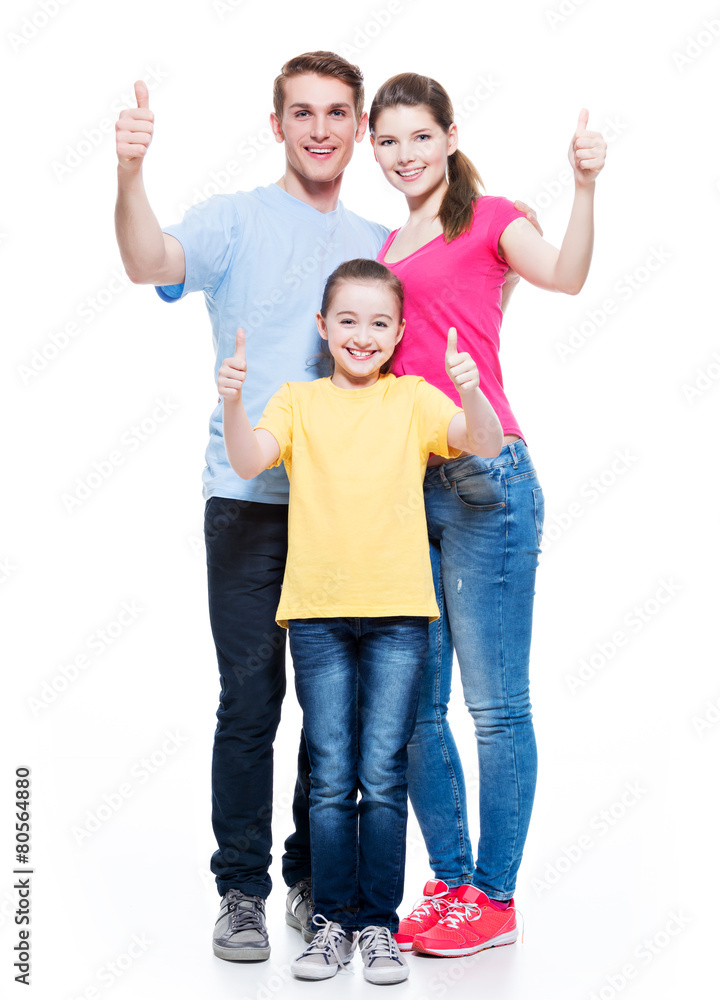 Happy family with child shows the thumbs up sign. Happy family with child shows the thumbs up sign.