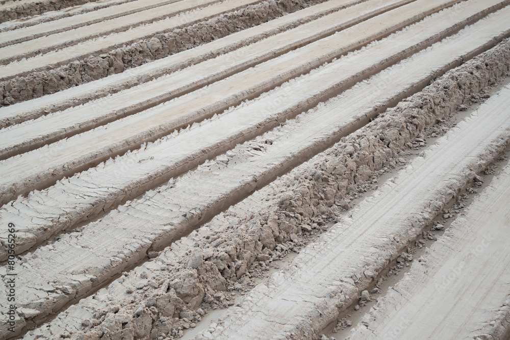 Fresh tractor traces in ground,Oblique line. Fresh tractor traces in ground,Oblique line.